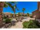 Inviting backyard with a sparkling pool, lush landscaping, and an outdoor seating area perfect for relaxing at 3622 E Sparrow Pl, Chandler, AZ 85286