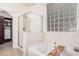Relaxing bathroom with a soaking tub, separate shower, and modern fixtures at 3622 E Sparrow Pl, Chandler, AZ 85286