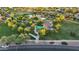 Aerial view of a community park featuring playgrounds, green spaces, walking paths, and mature trees at 3622 E Sparrow Pl, Chandler, AZ 85286