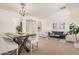 Open-concept living and dining area with ample seating and a bright, inviting atmosphere at 3622 E Sparrow Pl, Chandler, AZ 85286