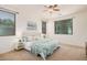 Serene main bedroom with a soft color palette, ceiling fan, and natural light at 3622 E Sparrow Pl, Chandler, AZ 85286