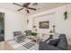 Cozy sitting area with a modern design, decorative plants, and a comfortable sofa at 3622 E Sparrow Pl, Chandler, AZ 85286