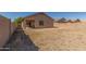 Wide backyard featuring a patio area, with plenty of space for outdoor activities and entertainment at 40027 W Pryor Ln, Maricopa, AZ 85138