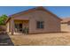 Backyard featuring a covered patio, and space for outdoor living and entertaining at 40027 W Pryor Ln, Maricopa, AZ 85138