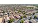 Aerial perspective of a dense neighborhood, revealing its residential architecture and streetscape at 40027 W Pryor Ln, Maricopa, AZ 85138