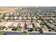 Aerial view showcasing the layout of a densely populated neighborhood with single-Gathering homes at 40027 W Pryor Ln, Maricopa, AZ 85138