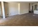 Open-concept living area with tile flooring, neutral paint, and access to other areas of the home at 4523 E Gleneagle Dr, Chandler, AZ 85249