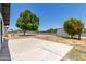Spacious backyard featuring a large concrete patio and mature tree, perfect for outdoor entertaining at 527 N Pasadena --, Mesa, AZ 85201
