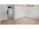 Bright bedroom with neutral walls, wood-look floors, and contemporary ceiling fan at 527 N Pasadena --, Mesa, AZ 85201