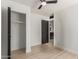 Bright bedroom with a view of the bathroom, closet, and new flooring at 527 N Pasadena --, Mesa, AZ 85201