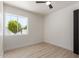 A bright bedroom features a view of the trees outside the window at 527 N Pasadena --, Mesa, AZ 85201