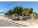 Quaint home with mature trees, fenced yard, and low-maintenance desert landscaping at 527 N Pasadena --, Mesa, AZ 85201