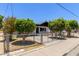 Charming home with a fenced yard and mature trees providing shade at 527 N Pasadena --, Mesa, AZ 85201