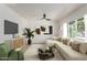 Bright living room featuring contemporary furniture, a ceiling fan and natural light at 527 N Pasadena --, Mesa, AZ 85201