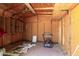 Spacious unfinished storage room with wood framing and shelving at 527 N Pasadena --, Mesa, AZ 85201