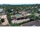 Large property with a swimming pool, three-car garage, and lush greenery, perfect for outdoor living at 6305 E Arabian Way, Paradise Valley, AZ 85253
