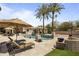 Resort-style backyard featuring a pool, lounge chairs, and beautifully landscaped grounds, creating a serene oasis at 6305 E Arabian Way, Paradise Valley, AZ 85253