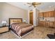 Cozy bedroom with a ceiling fan, and a private wet bar and cabinets at 6305 E Arabian Way, Paradise Valley, AZ 85253