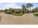 Stunning home with paver driveway, manicured lawn, and lush landscaping at 6305 E Arabian Way, Paradise Valley, AZ 85253