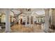 Expansive living space has custom columns, tile floors, and multiple entertaining areas at 6305 E Arabian Way, Paradise Valley, AZ 85253