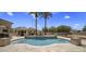 Backyard pool with water features and tropical landscaping, perfect for outdoor enjoyment at 6305 E Arabian Way, Paradise Valley, AZ 85253