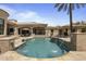 Stunning pool area featuring fountains, lush landscaping, and an expansive patio, perfect for relaxation and entertainment at 6305 E Arabian Way, Paradise Valley, AZ 85253