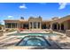 Private backyard oasis with a luxurious pool, spa, and spacious patio area for entertaining at 6305 E Arabian Way, Paradise Valley, AZ 85253