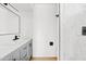Modern bathroom features a double sink vanity, elegant fixtures, and stylish marble shower tiles at 6420 S Wilson St, Tempe, AZ 85283