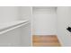Spacious walk-in closet with built-in shelving and ample storage space at 6420 S Wilson St, Tempe, AZ 85283