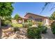 Well maintained backyard featuring decorative rock and desert landscaping at 6758 W Quail Ave, Glendale, AZ 85308