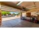 Spacious garage with a variety of storage and easy access to the driveway and street at 723 N Joshua Tree Ln, Gilbert, AZ 85234