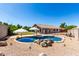Inviting backyard pool and patio area perfect for relaxing and entertaining outdoors at 723 N Joshua Tree Ln, Gilbert, AZ 85234