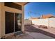 Backyard featuring a cozy seating area and a gravel landscape design at 7603 W Oraibi Dr, Glendale, AZ 85308