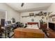Bedroom featuring wood furnishings and ample electronic devices on display at 7603 W Oraibi Dr, Glendale, AZ 85308