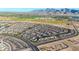 A Primary-planned community with uniform homes, landscaping, and community amenities at 12122 W Levi Dr, Avondale, AZ 85323