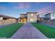 Spacious backyard with artificial turf, perfect for relaxation and outdoor activities, enhancing the home's appeal at 12122 W Levi Dr, Avondale, AZ 85323