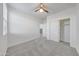Bright bedroom featuring sliding closet doors and a window providing natural light at 12122 W Levi Dr, Avondale, AZ 85323