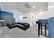 Loft space showcases comfortable seating and neutral decor, perfect for relaxation at 12122 W Levi Dr, Avondale, AZ 85323