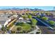 A Primary-planned community featuring a lush park, play areas, and scenic mountain views at 12122 W Levi Dr, Avondale, AZ 85323