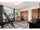 Bedroom with a bunk bed ladder and a cozy recliner at 1353 W Kiowa Ave, Mesa, AZ 85202