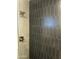 Close-up of shower tile showcasing a unique elongated hexagonal design and modern shower fixtures at 1353 W Kiowa Ave, Mesa, AZ 85202
