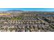 The aerial view captures a sprawling residential community, highlighting the density and variety of homes in the area at 15276 W Latham St, Goodyear, AZ 85338