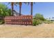 Fulton Homes Estrella Commons brick signage welcomes residents and guests to the neighborhood at 15276 W Latham St, Goodyear, AZ 85338