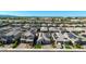 Street view of the property showcasing well-maintained landscaping, and solar panels at 15276 W Latham St, Goodyear, AZ 85338