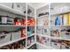 Organized pantry with ample shelving and storage baskets at 15276 W Latham St, Goodyear, AZ 85338