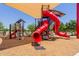Vibrant community playground featuring slides, climbing structures, and shade coverings for outdoor recreation at 15276 W Latham St, Goodyear, AZ 85338