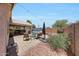 Backyard featuring a pool, patio area, and seating, perfect for outdoor relaxation and entertainment at 15505 N 135Th Dr, Surprise, AZ 85374