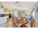 Charming dining area open to the kitchen and living room, perfect for entertaining at 15505 N 135Th Dr, Surprise, AZ 85374
