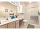 Bright bathroom boasts walk in shower and lots of counter space for storage and organization at 17108 N Estrella Vista Dr, Surprise, AZ 85374