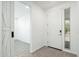 Bright entryway featuring modern door and window with lots of natural light at 17652 W Fetlock Trl, Surprise, AZ 85387